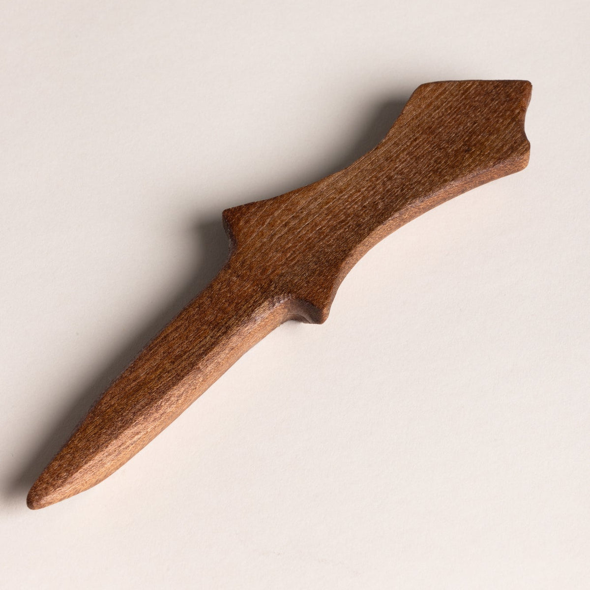 Back view of the Burr Elm Sgian Dubh on a white background